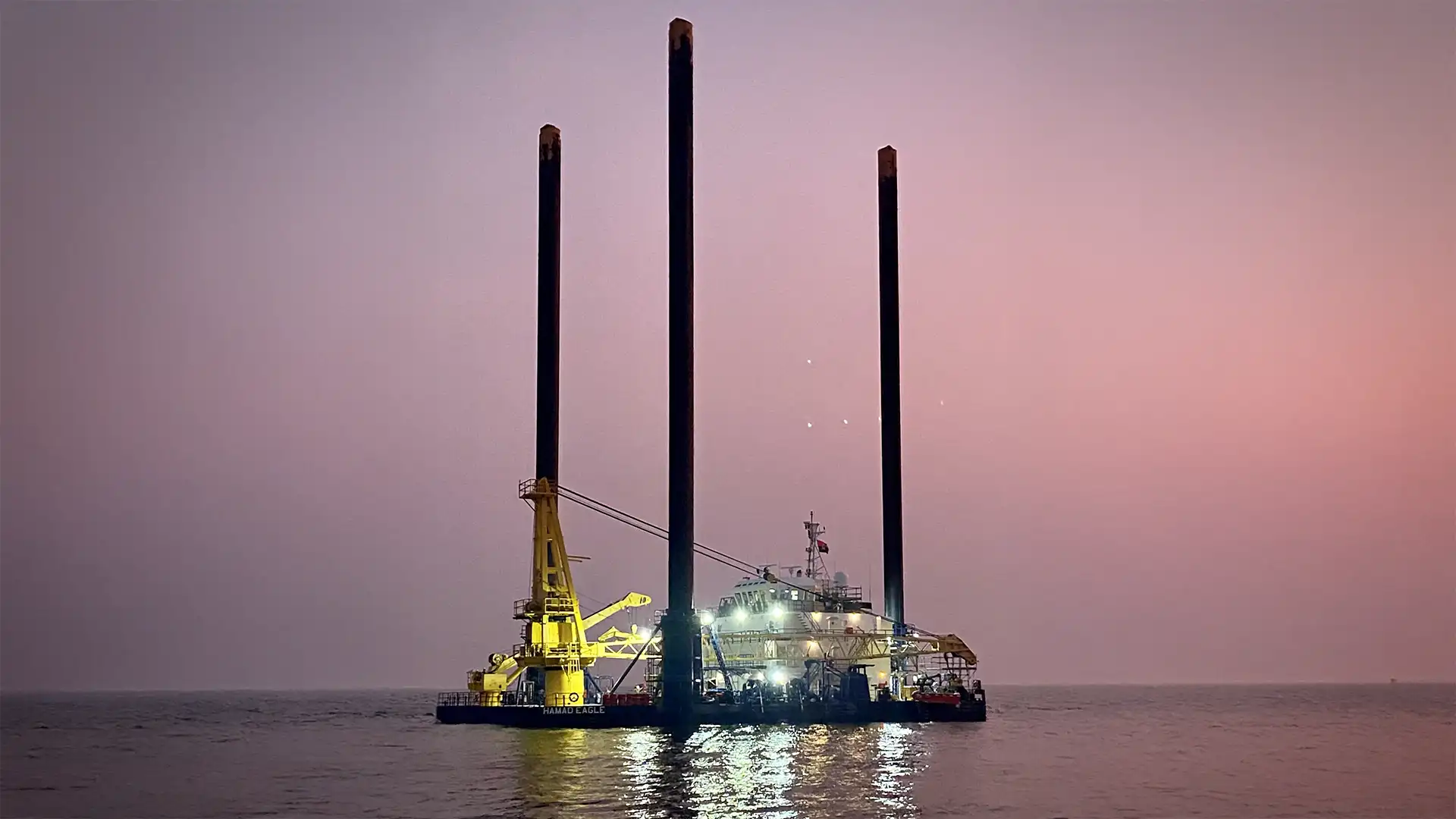 Offshore crewing and marine services by Quinn Marine liftboat team at sunset